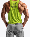 A Muscular Man Wearing a Tank Top and Sweatpants Mockup