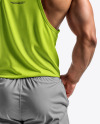 A Muscular Man Wearing a Tank Top and Sweatpants Mockup