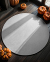 Round Rug on Wooden Floor with Pumpkins Around It Mockup