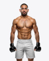 Male UFC Fighter Wearing Shorts and Black Gloves Mockup