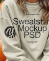 Young Woman in Sweatshirt Sitting on Hay Block with Pumpkins Around Mockup
