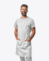 Man Wearing an Apron and a T-Shirt Mockup