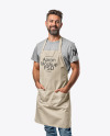 Man Wearing an Apron and a T-Shirt Mockup