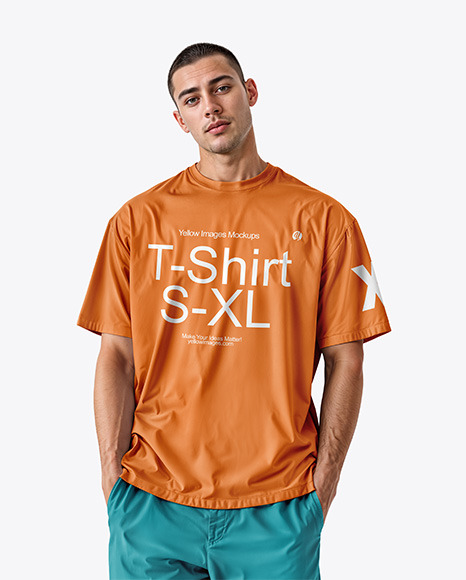 Man Wearing an Oversize T-shirt Mockup - Crop tee mockup