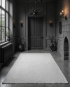 Rectangular Carpet in a Black Room with Fireplace Mockup
