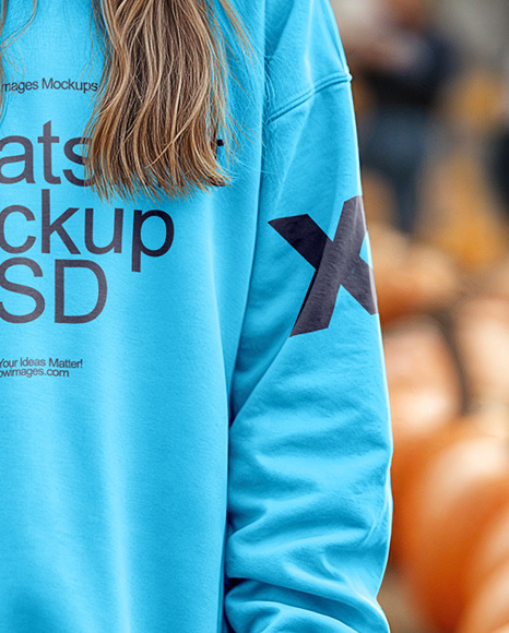 Young Woman in Sweatshirt Standing in a Pumpkin Patch Mockup