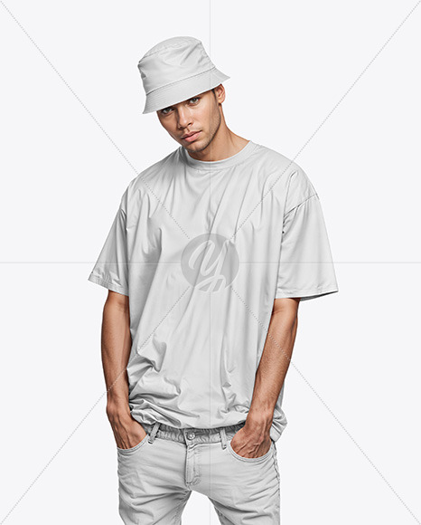 A Man Wearing an Oversize T-Shirt and a Bucket Hat Mockup