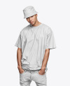 A Man Wearing an Oversize T-Shirt and a Bucket Hat Mockup