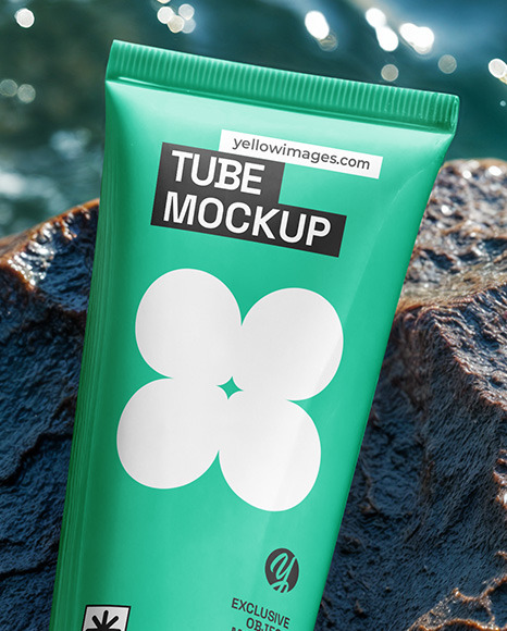 Cosmetic Tube on a Stone Surrounded by Water Mockup