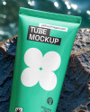 Cosmetic Tube on a Stone Surrounded by Water Mockup