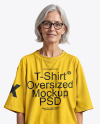 Elderly Woman in Glasses Wearing an Oversized Half Sleeve T-Shirt Mockup