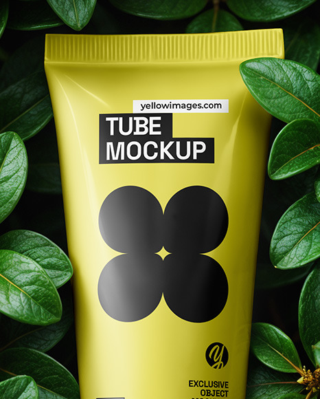 Matte Cosmetic Tube on Leaves Mockup