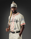 Afro-American Baseball Player Wearing a Jersey and Cap Holding a Bat Mockup