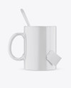 Glossy Mug With Tea Bag & Spoon Mockup