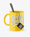 Glossy Mug With Tea Bag &amp; Spoon Mockup (High-Angle Shot)