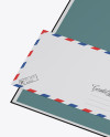 Leather Folder with Papers and Envelope Mockup - Half Side View (High-Angle Shot)