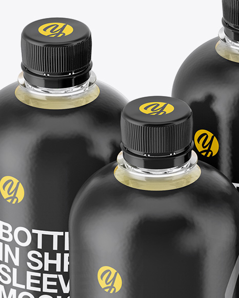 Bottles with Juice in Shrink Sleeves Mockup - Half Side View (High-Angle Shot)