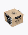 Clear Glass Sauce Jar in Kraft Paperboard Sleeve Mockup - Half Side View Clear Glass Sauce Jar in Kraft Paperboard Sleeve Mockup - Half Side View