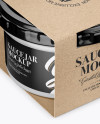 Clear Glass Sauce Jar in Kraft Paperboard Sleeve Mockup - Half Side View Clear Glass Sauce Jar in Kraft Paperboard Sleeve Mockup - Half Side View