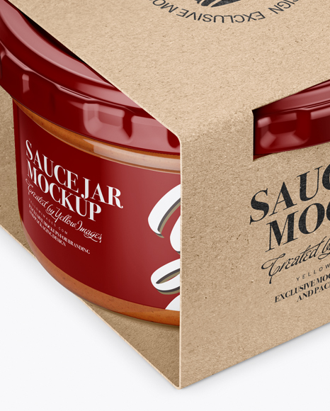 Clear Glass Sauce Jar in Kraft Paperboard Sleeve Mockup - Half Side View Clear Glass Sauce Jar in Kraft Paperboard Sleeve Mockup - Half Side View