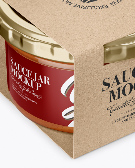 Clear Glass Sauce Jar in Kraft Paperboard Sleeve Mockup - Half Side View Clear Glass Sauce Jar in Kraft Paperboard Sleeve Mockup - Half Side View