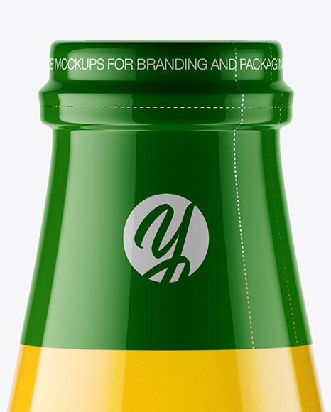 Clear Glass Bottle w/ Orange Juice Mockup