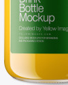 Clear Glass Bottle w/ Orange Juice Mockup