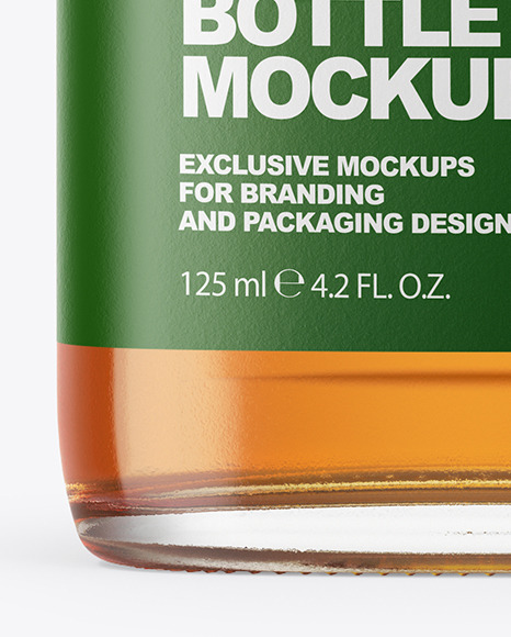 Clear Glass Bottle with Whisky Mockup