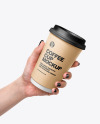 Coffee Cup in a Hand Mockup