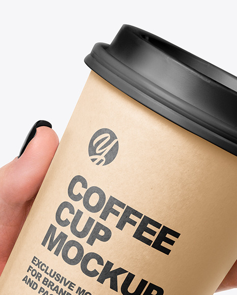 Coffee Cup in a Hand Mockup