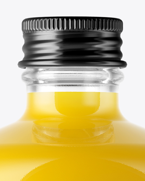 Clear Glass Bottle With Orange Juice Mockup