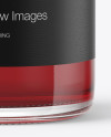 Clear Glass Bottle with Red Drink Mockup