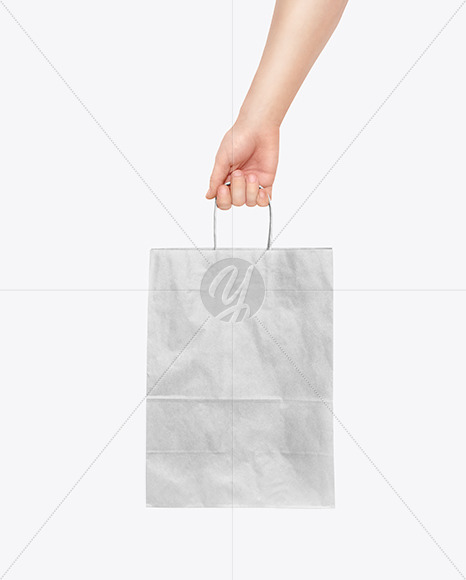 Hand w/ Paper Bag Mockup