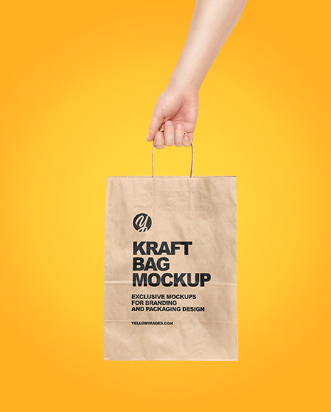 Hand w/ Paper Bag Mockup