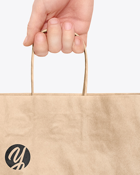 Hand w/ Paper Bag Mockup