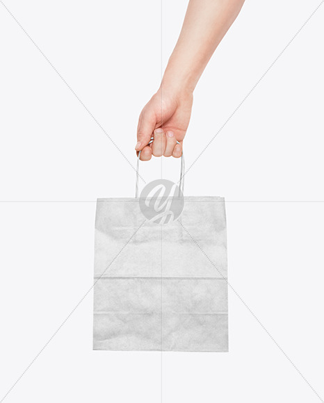 Hand w/ Paper Bag Mockup