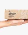 Paper Box in a Hand Mockup