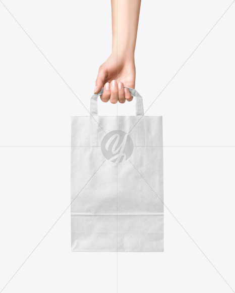 Hand w/ Paper Bag Mockup