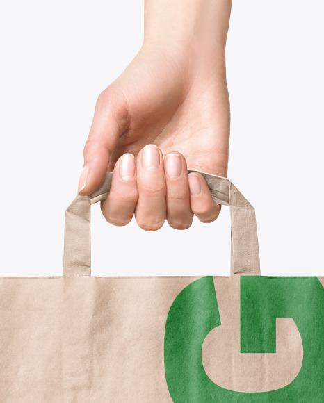 Hand w/ Paper Bag Mockup