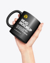 Matte Mug in a Hand Mockup