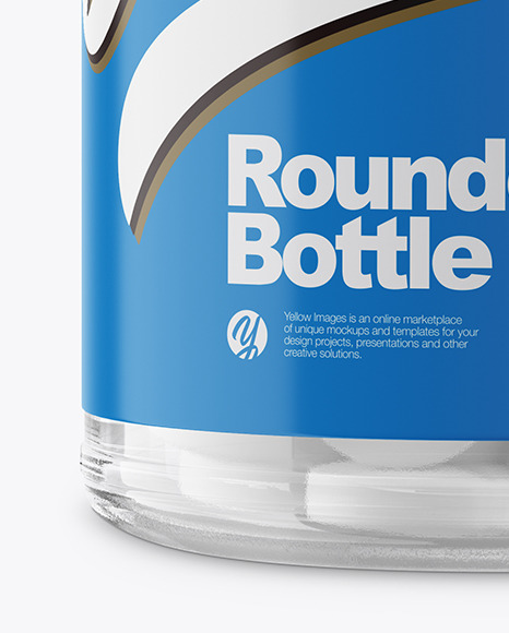 Clear Glass Bottle with Rounded Pills Mockup - Front View