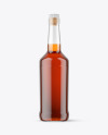 Clear Glass Bottle with Whisky Mockup