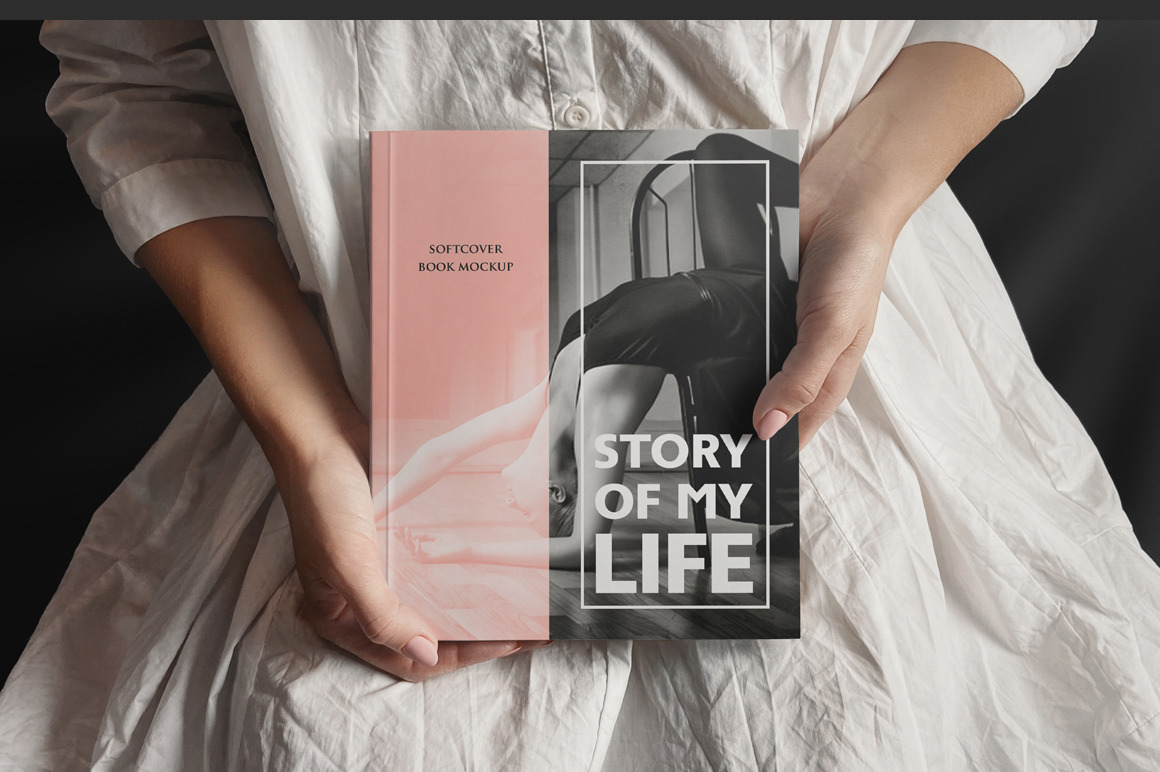 Woman Holding Softcover Book Mockup