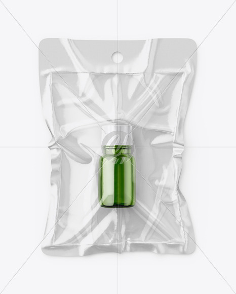 Vacuum Flow-Pack With Small Green Glass Bottle Mockup - Top View