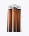 Three 25ml Dark Amber Sport Nutrition Bottles Mockup