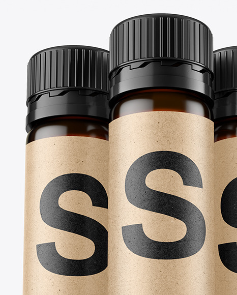 Three 25ml Dark Amber Sport Nutrition Bottles Mockup